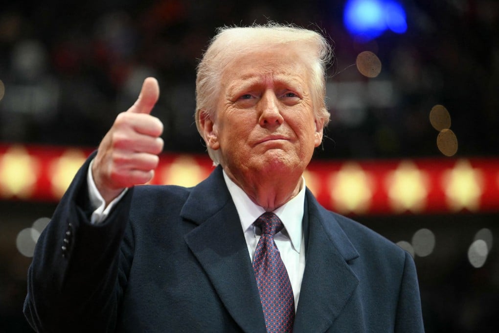 US President Donald Trump gives a thumbs up as he arrives in Washington in January. Photo: TNS