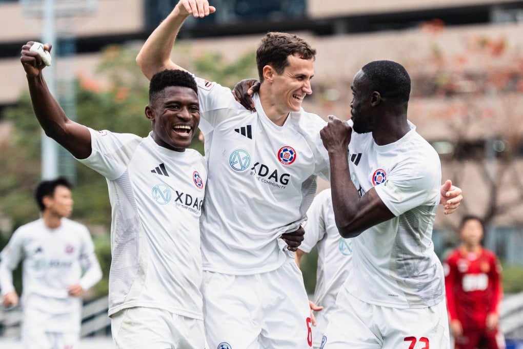 Aleksandar Mitrovic (centre) celebrates his first Eastern goal with teammates Noah Baffoe (left) and Nii Noye Narh. Photo: Eastern SC