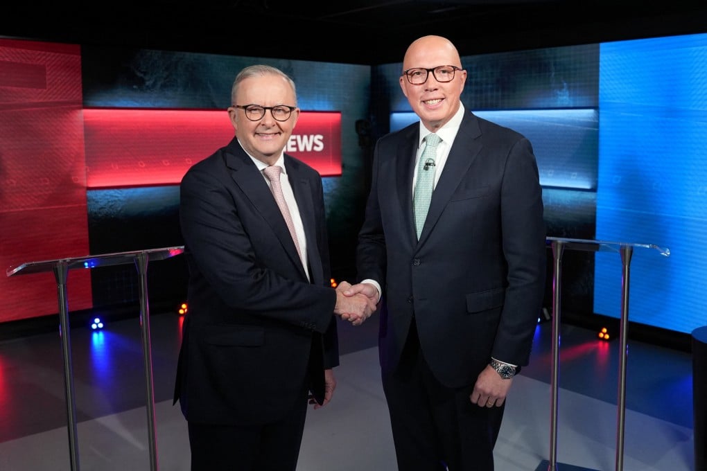 Australian Prime Minister Anthony Albanese (left) and opposition leader Peter Dutton shake hands ahead of the second leaders’ debate of the 2025 election campaign in Sydney on April 16. Photo: AAP Image/Reuters