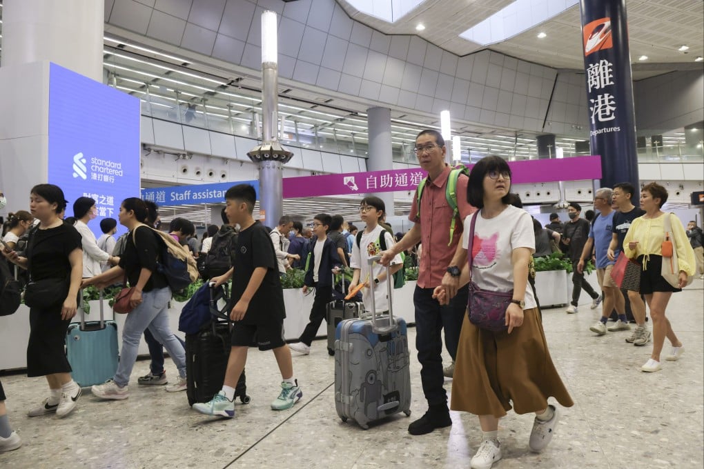 Travellers at West Kowloon station on a busy first day of the Easter holiday. Photo: Jelly Tse