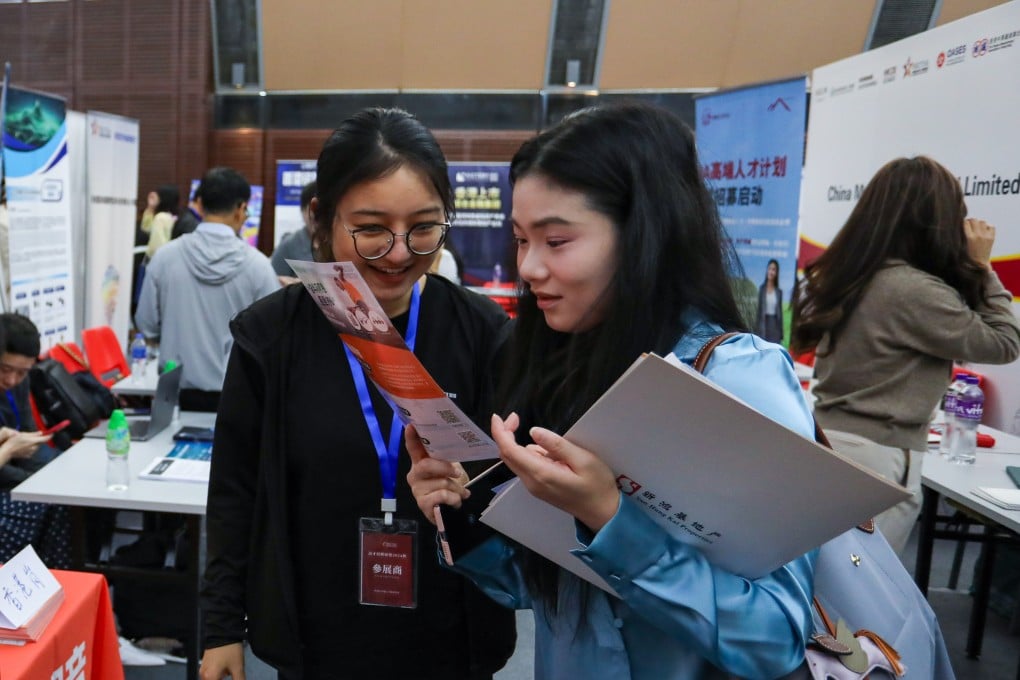 Mainland professionals browse job opportunities with recruiters at the Hong Kong Top Talent Recruitment Autumn Fair in Tsim Sha Tsui, on November 8, 2024. Photo: Fan Chen