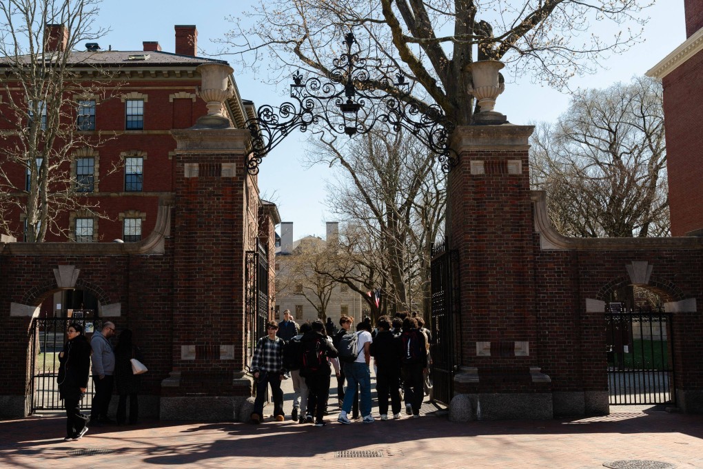 Students gather at one of the gates of Harvard University in Cambridge, Massachusetts. Photo: Getty Images