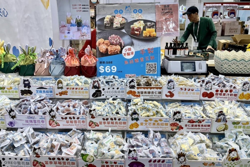 A worker sets up for the Hong Kong International Food Tasting Festival 2025 at the Hong Kong Convention and Exhibition Centre in Wan Chai. Photo: Handout