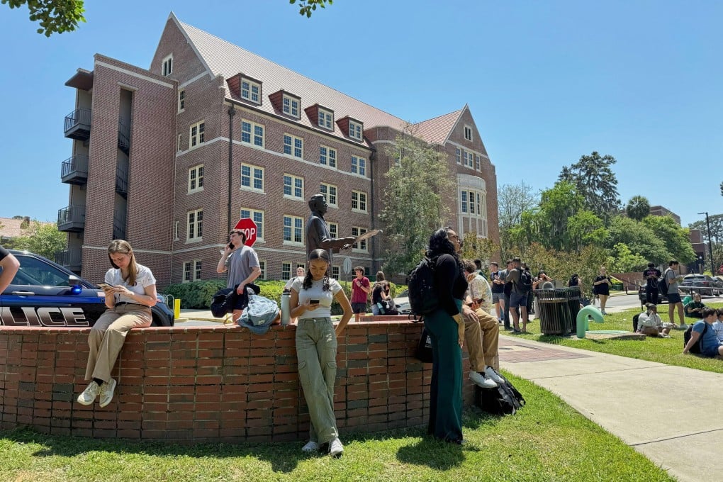 Florida State University students wait for news amid an active shooter incident, in Tallahassee, Florida on Thursday. Photo: AP