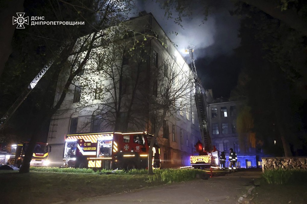 Firefighters extinguish a blaze following a Russian attack in Ukraine’s Dnipro on April 17. Photo: Ukrainian Emergency Service via AP