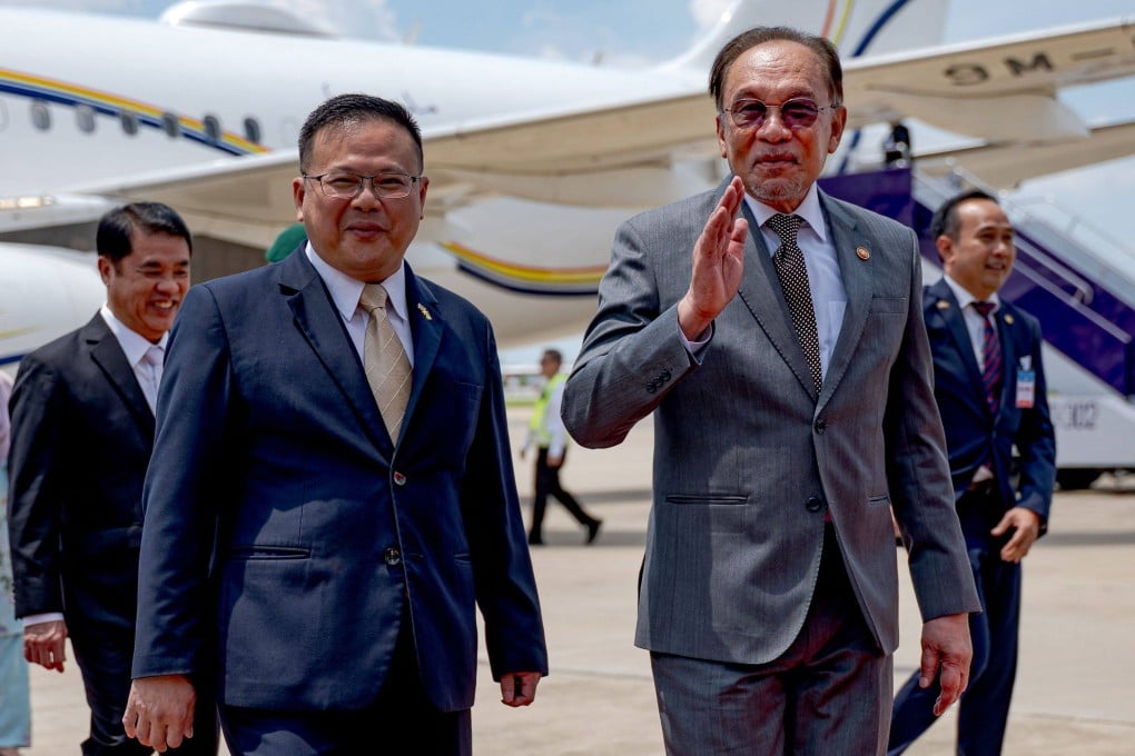 Malaysian Prime Minister Anwar Ibrahim (right) arrives at an airport in Bangkok on April 17. Photo: Prime Minister’s Office of Malaysia/AFP