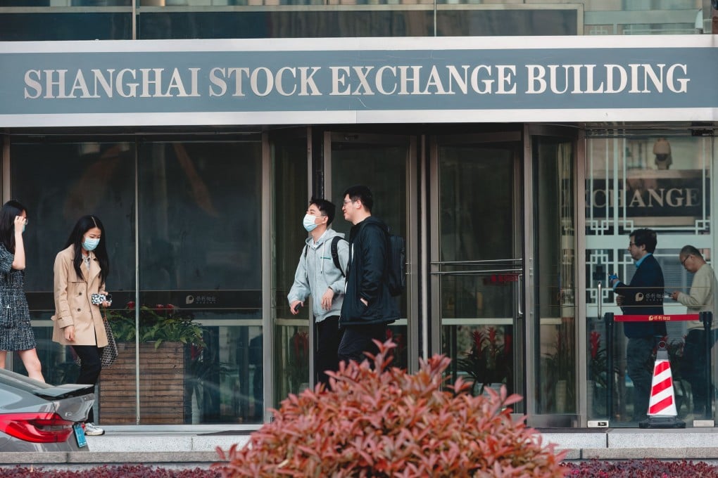 People walk past the Shanghai Stock Exchange Building on April 9, 2025. Photo: EPA-EFE