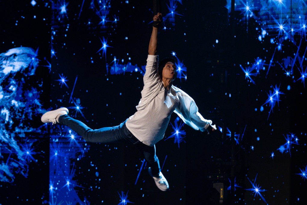 Hong Kong aerialist Jimmy Wong in action. He talks about why he moved from calisthenics to aerial straps, getting dizzy during performances and more. Photo: Courtesy of Jimmy Wong