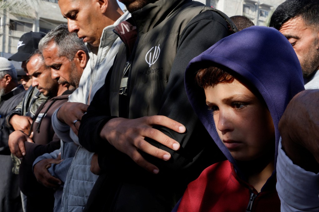 People pray near the bodies of Palestinians killed in Israeli strikes, at Nasser hospital, in Khan Younis, in the southern Gaza Strip, on Saturday. Photo: Reuters