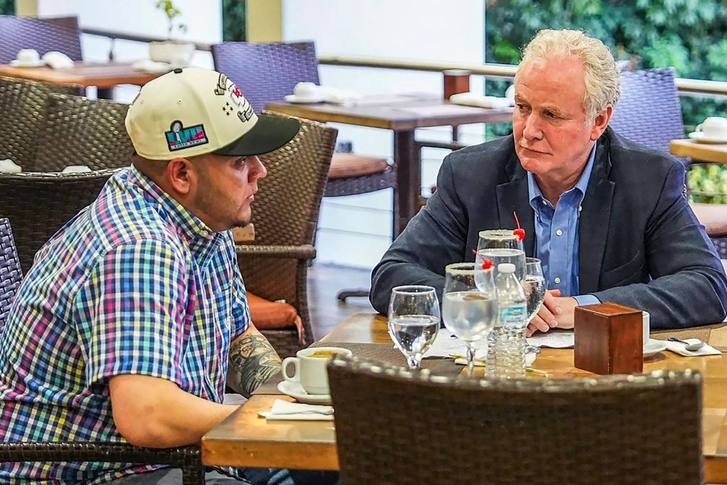 US Senator Chris Van Hollen (right) meets Kilmar Abrego Garcia at a hotel in San Salvador on Thursday. Photo: X/nayibbukele via AFP