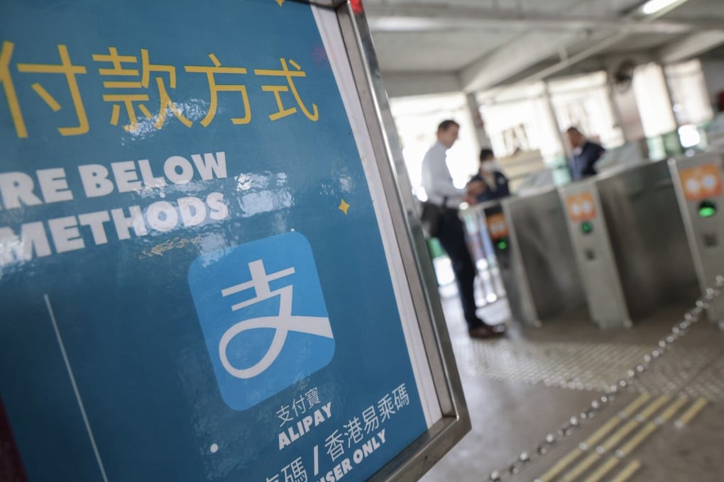 Passengers pay for the Star Ferry from Tsim Sha Tsui to Central next to an advertisement for Alipay on December 19, 2024. Photo: Jelly Tse