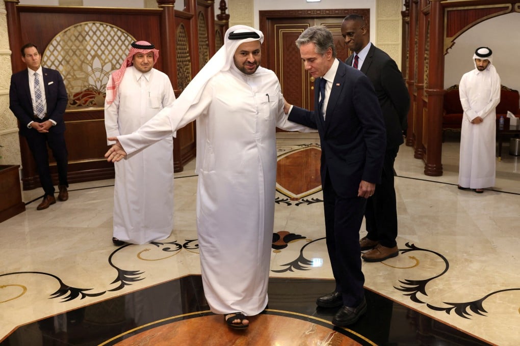 Qatari Minister of State Dr. Mohammed bin Abdulaziz Al-Khulaifi welcomes then-US Secretary of State Antony Blinken, in Doha, Qatar, on 20 August last year. Photo: Reuters