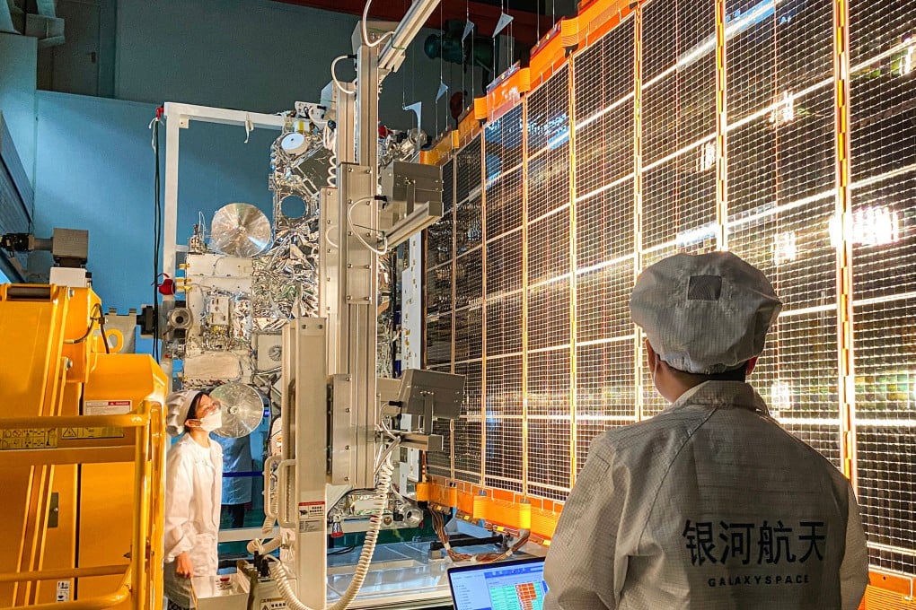 Chinese technicians test a flexible solar wing to be used in a satellite mega constellation in low Earth orbit. The US-China trade war has provided Beijing with fresh incentive to lower the costs of China’s satellite programme. Photo: Weibo