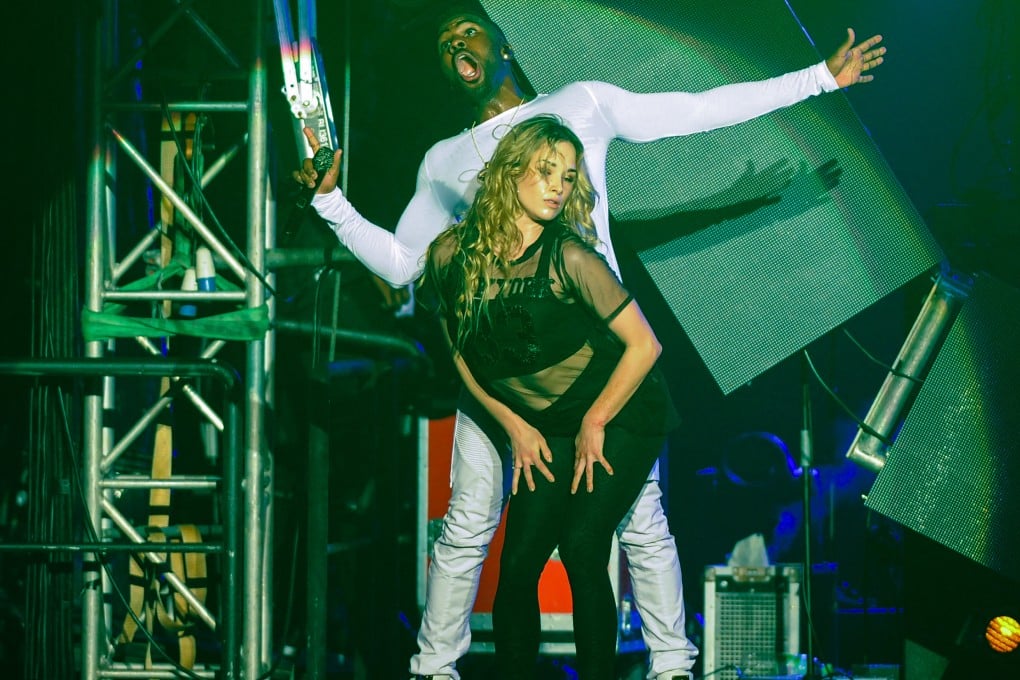 US singer-songwriter Jason Derulo (left) performs on stage at a concert in Malaysia in 2015. Photo: AFP