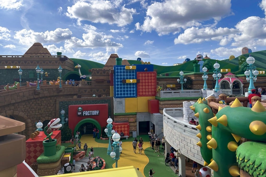 At Universal Epic Universe’s Super Nintendo World, guests with Power-Up Bands (US$42) can hit the familiar question-mark boxes of the Mario universe, track their Mario Kart score and play drums like Donkey Kong to unveil hidden effects and Easter eggs. Photo: TNS