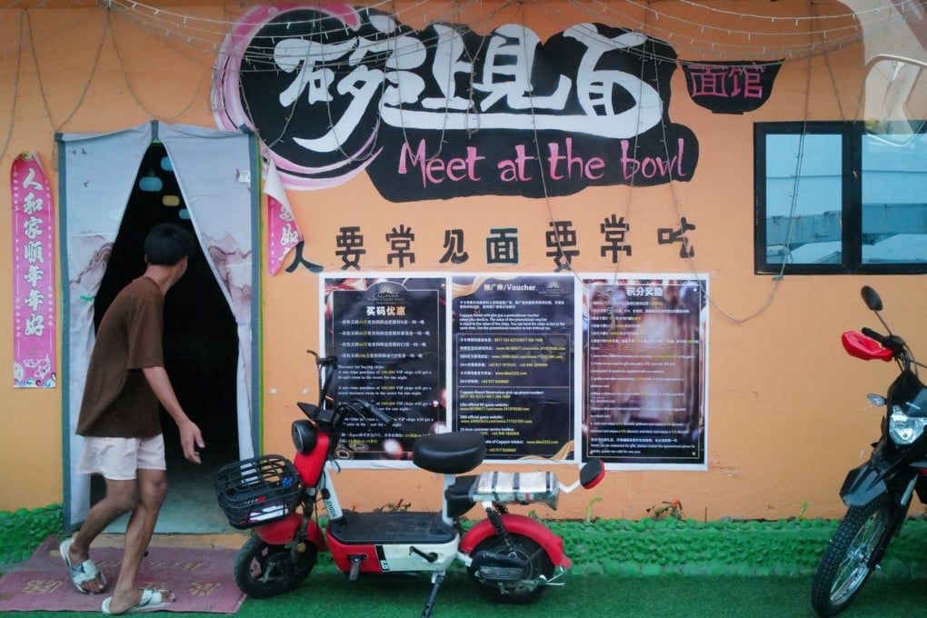 A Chinese man outside a restaurant in Cagayan in the Philippines. Photo: Jeoffrey Maitem