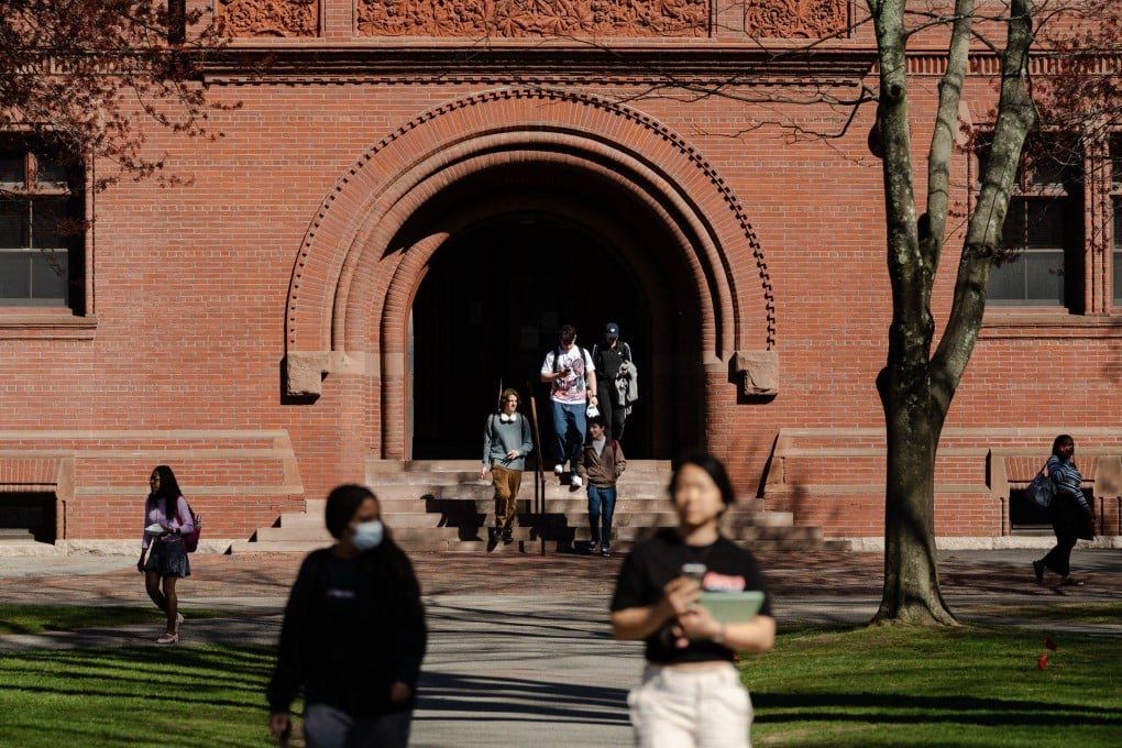 People cross the Harvard Yard at Harvard University on April 17. In the showdown between US President Donald Trump and Harvard University, support for the university is galvanising across the academic and political spectrum. Photo: Getty Images via AFP