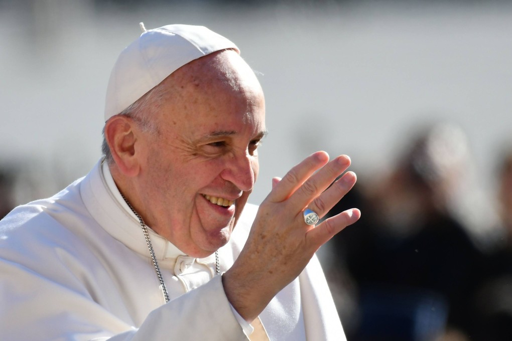 Pope Francis waves to the crowd as he arrives for a weekly general audience at St Peter’s square in 2017 at the Vatican. Photo: AFP