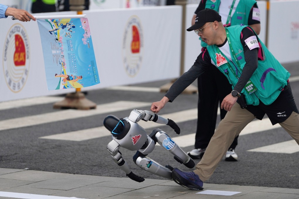 A robot loses control at the start of what is billed as the world’s first robot half-marathon in Beijing on April 19. Photo: AP