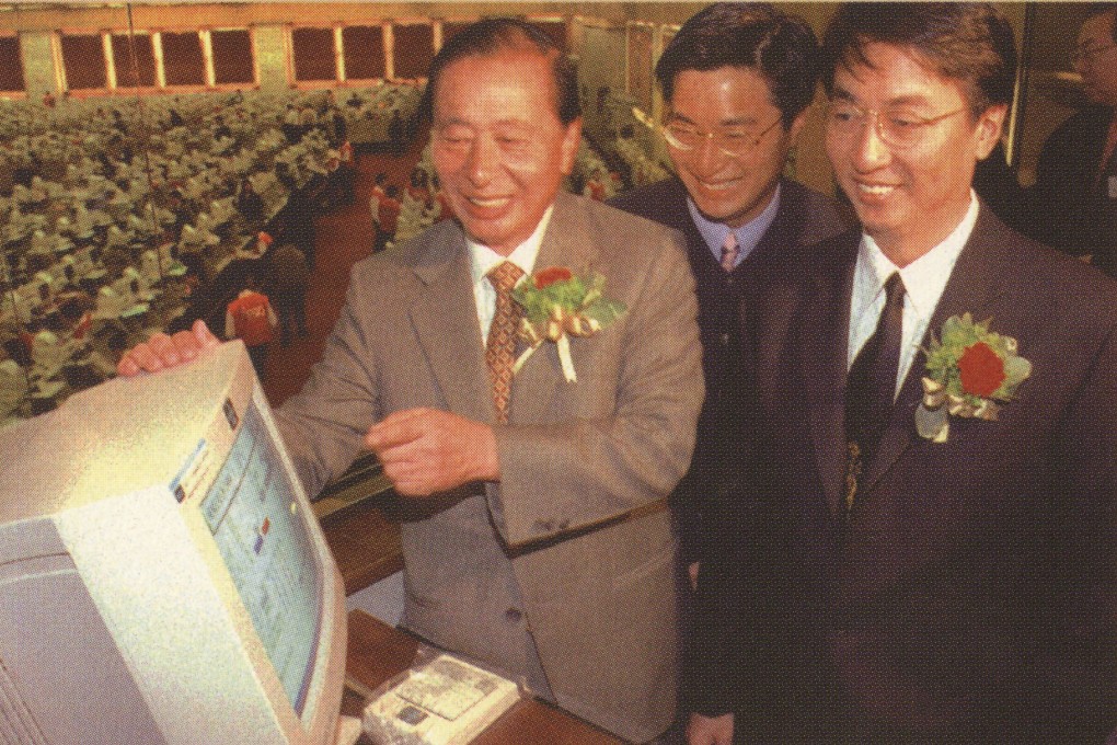 Lee Shau-kee (left) with his sons at the listing of Henderson Land in 1981. Photo: Handout