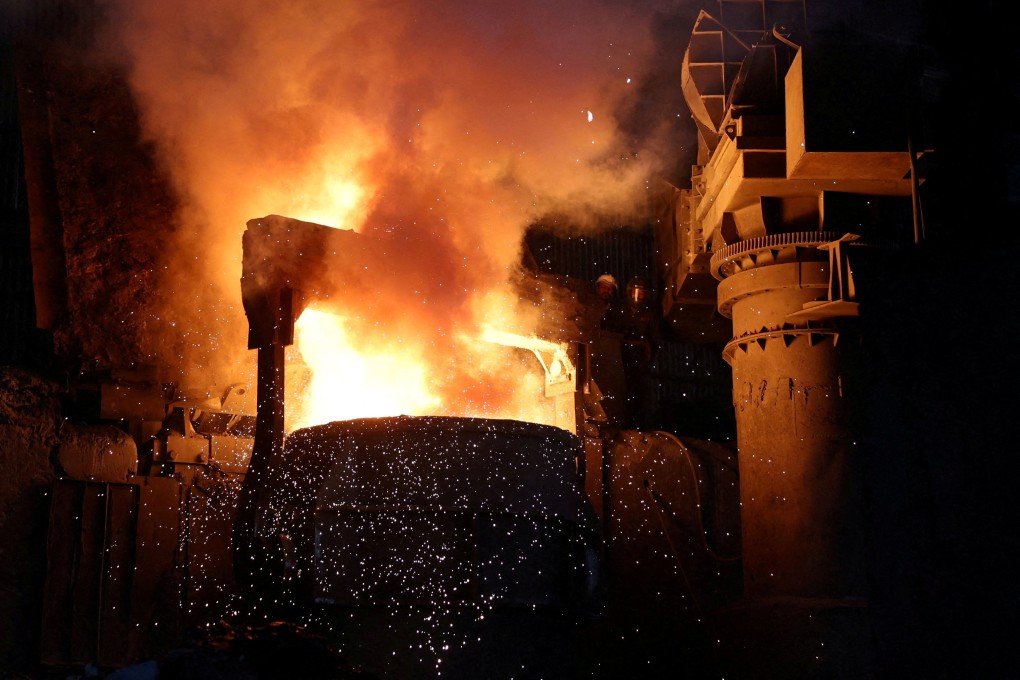 An employee works at a steel bar manufacturing facility in the western Indian state of Gujarat on April 7. Photo: Reuters