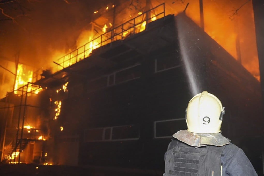 Rescuers working at the site of a drone hit in Odesa, Ukraine on Tuesday. Photo: EPA-EFE/State Emergency Service of Ukraine