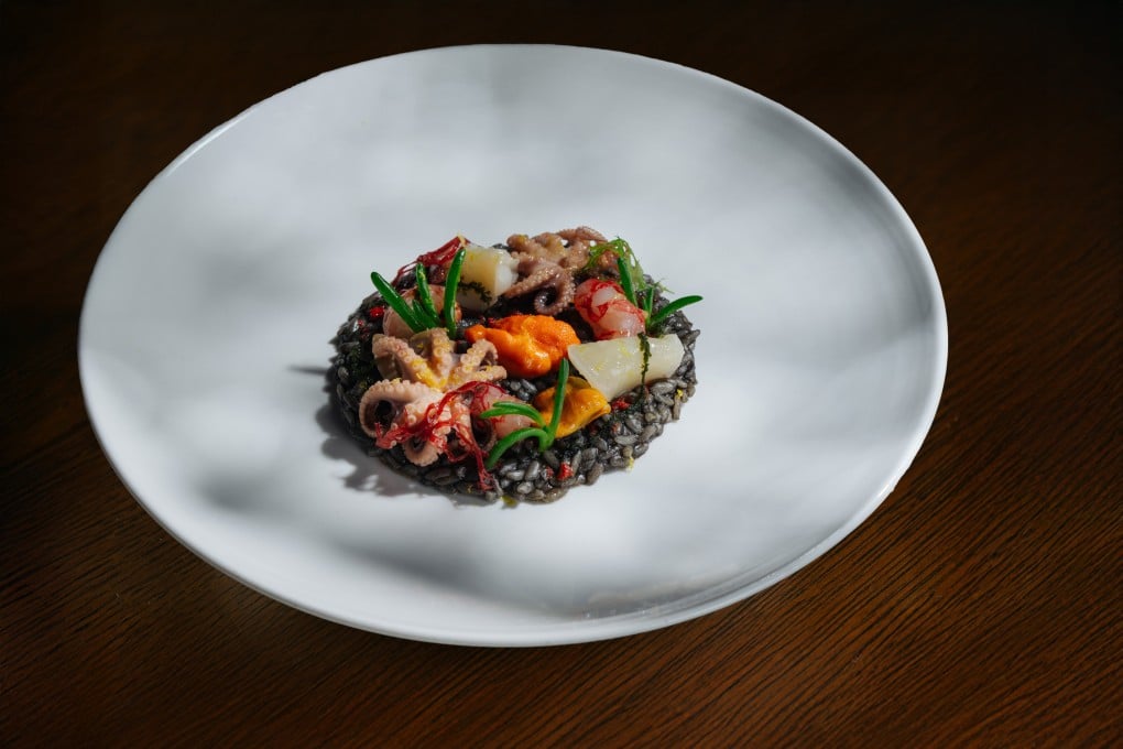 Black ink risotto “Lo Scoglio” at Aqua in Hong Kong, part of its Ankh tasting menu. Photo: Handout