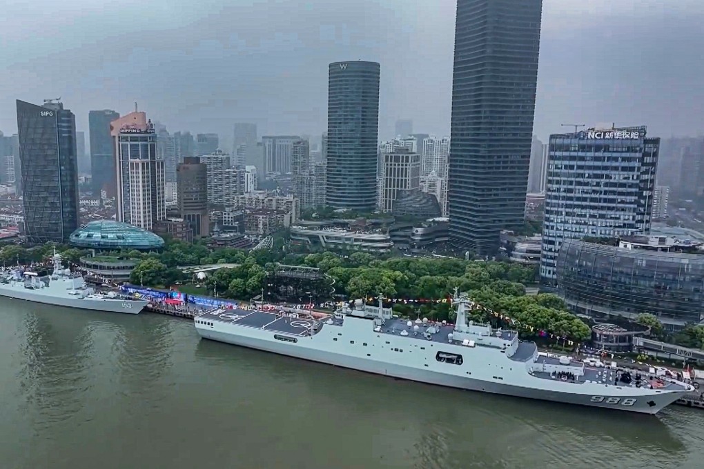 China’s Xian and Yimeng Shan are berthed in Shanghai on Wednesday as part of celebrations of the Chinese Navy. Photo: CCTV
