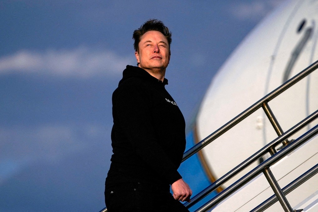 Elon Musk boards Air Force One in New Jersey on March 22. Photo: Reuters