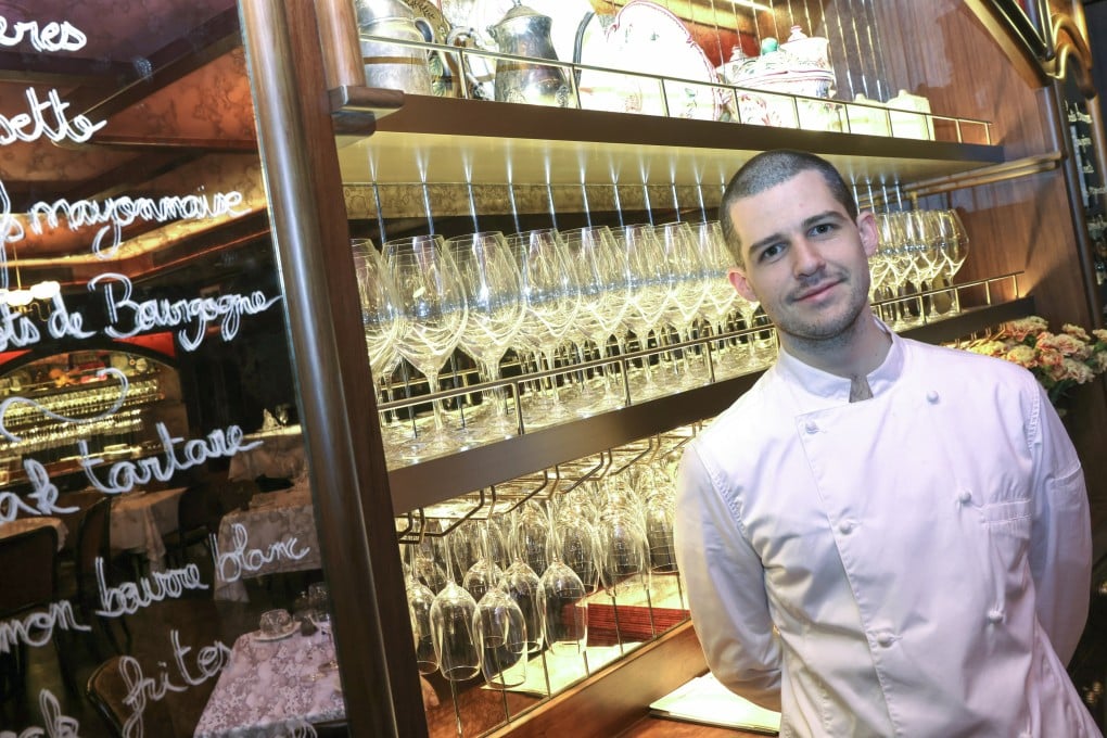 Jean-Pierre chef John Troupis stands behind the bar at the new French restaurant in Central, Hong Kong. Photo: Jelly Tse