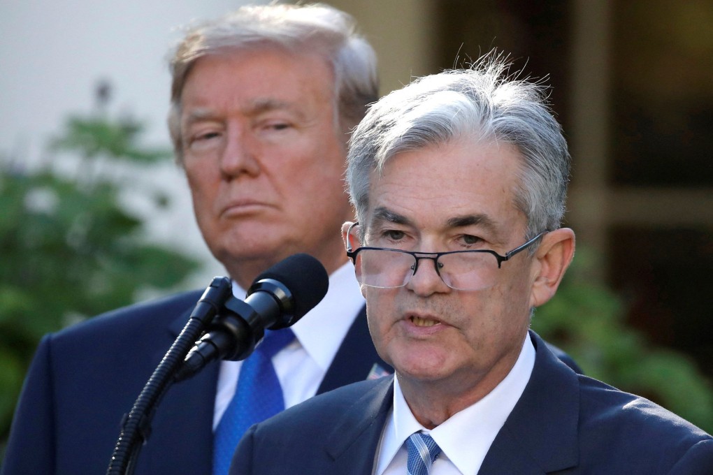 US President Donald Trump looks on as Jerome Powell speaks at the White House in November 2017. Photo: Reuters