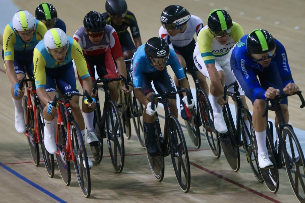 Chu Tsun-wai (centre, light blue) rides in the elimination race at the Hong Kong International Track Cup on Monday. Photo: Jonathan Wong