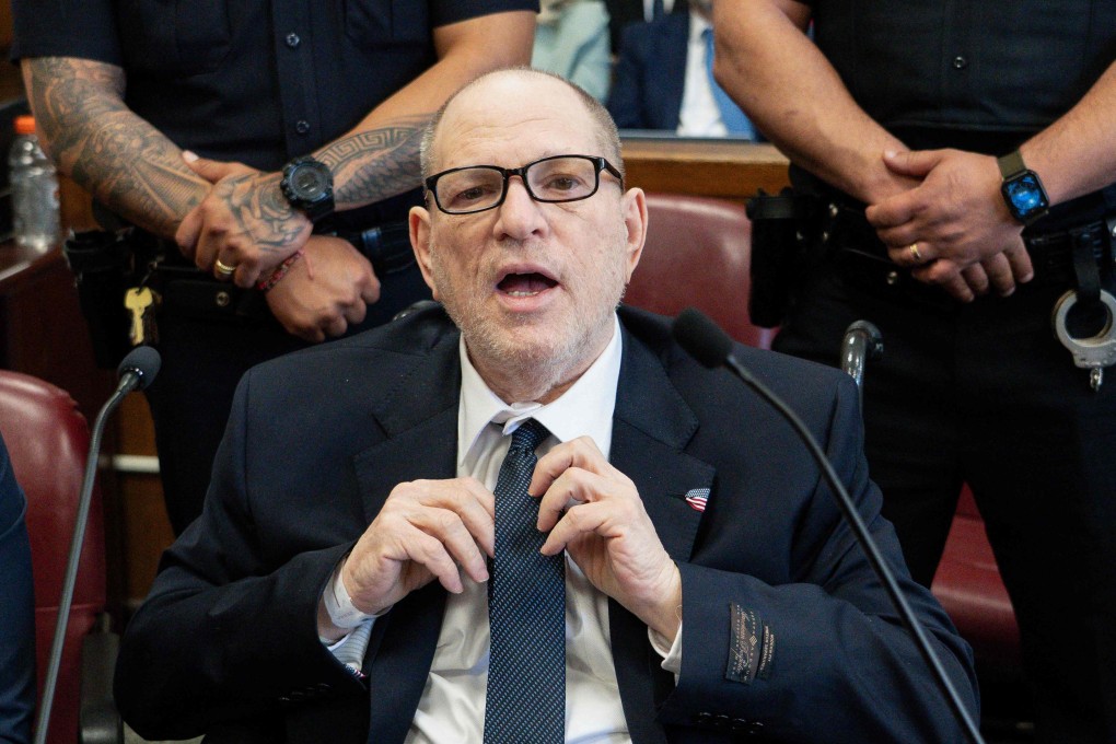 Disgraced Hollywood film producer Harvey Weinstein adjusts his tie as he appears in Manhattan Criminal Court in New York on Wednesday. Photo: AFP