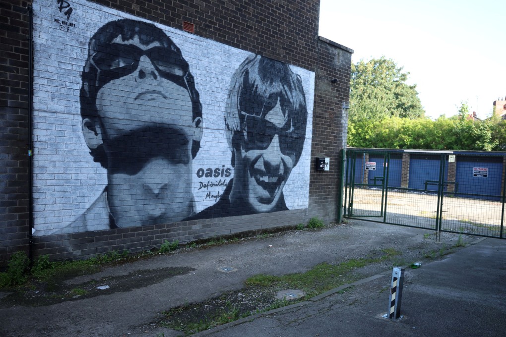 A mural of Oasis band members Liam and Noel Gallagher in Manchester, Britain. Photo: Reuters