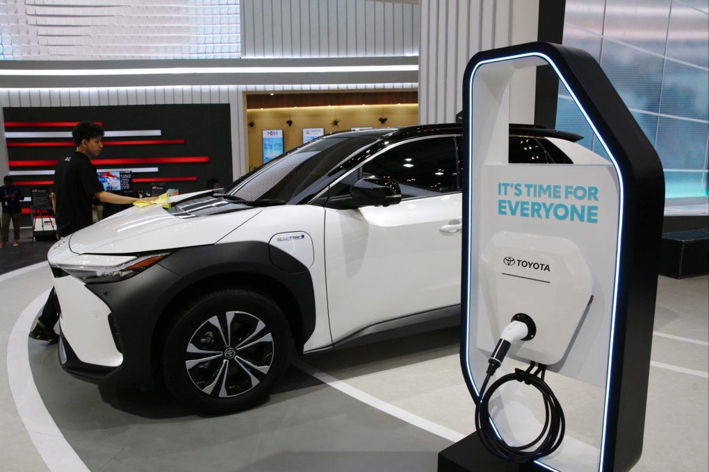 An electric car at an Indonesian auto show in 2023. Indonesia will keep its plan to build its electric vehicle battery supply chain despite LG’s exit from a mega project. Photo: EPA-EFE