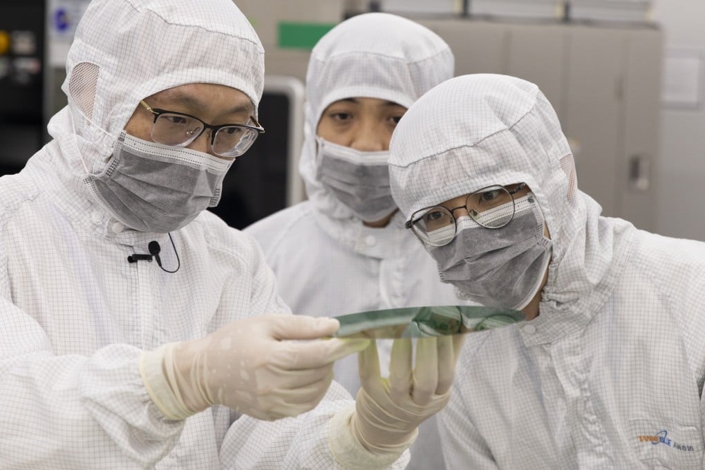 Researchers examine semiconductor materials in a lab. A new scientific journal ranking system introduced by Beijing is intended as a “positive guide” to help elevate the work of the nation’s leading scientists. Photo: Xinhua
