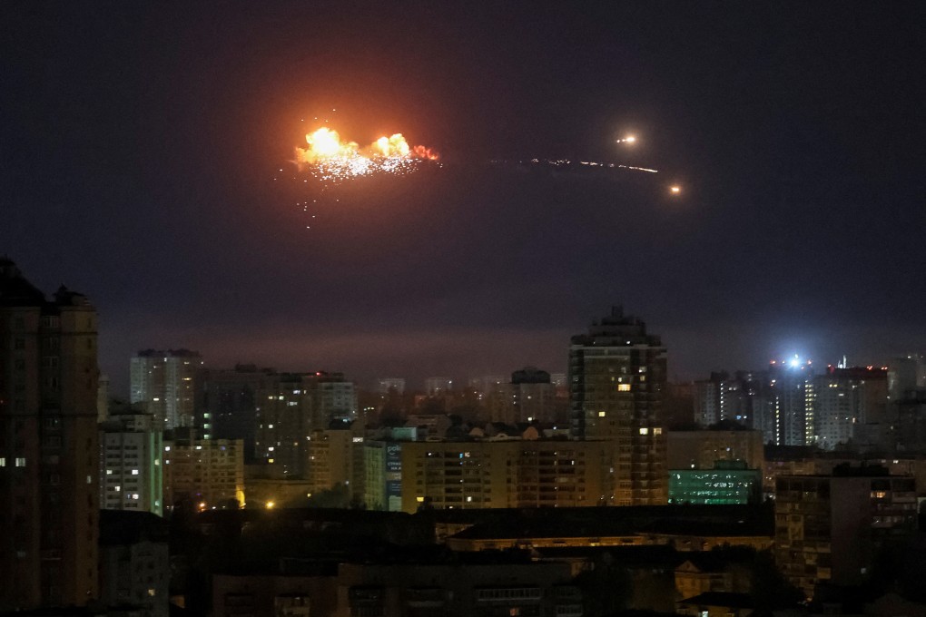 A Russian ballistic missile explodes in the sky over the city in Kyiv on Thursday. Photo: Reuters