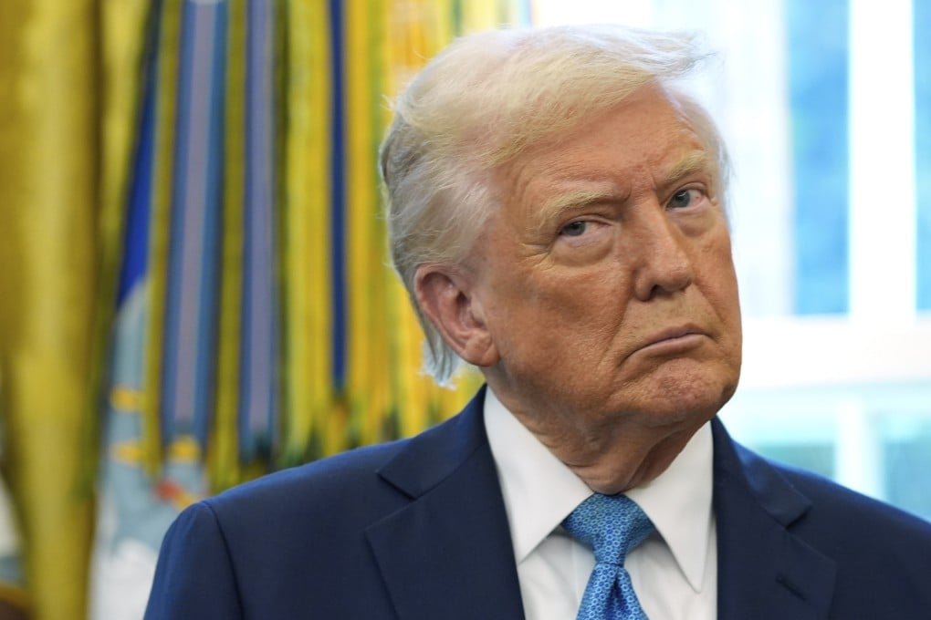 US President Donald Trump is seen in the Oval Office of the White House on Tuesday. Photo: AP