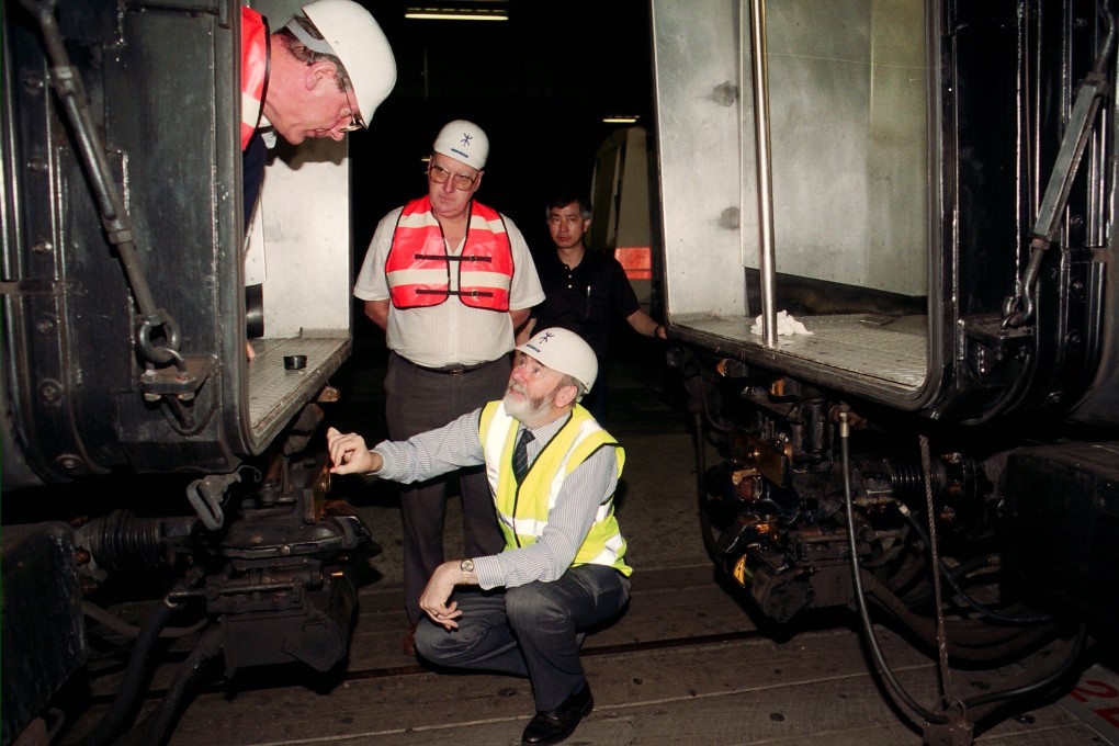 Alan Cooksey, a British railway expert brought in from the UK a month after the incident, examines the train couplings. Photo: SCMP Archives