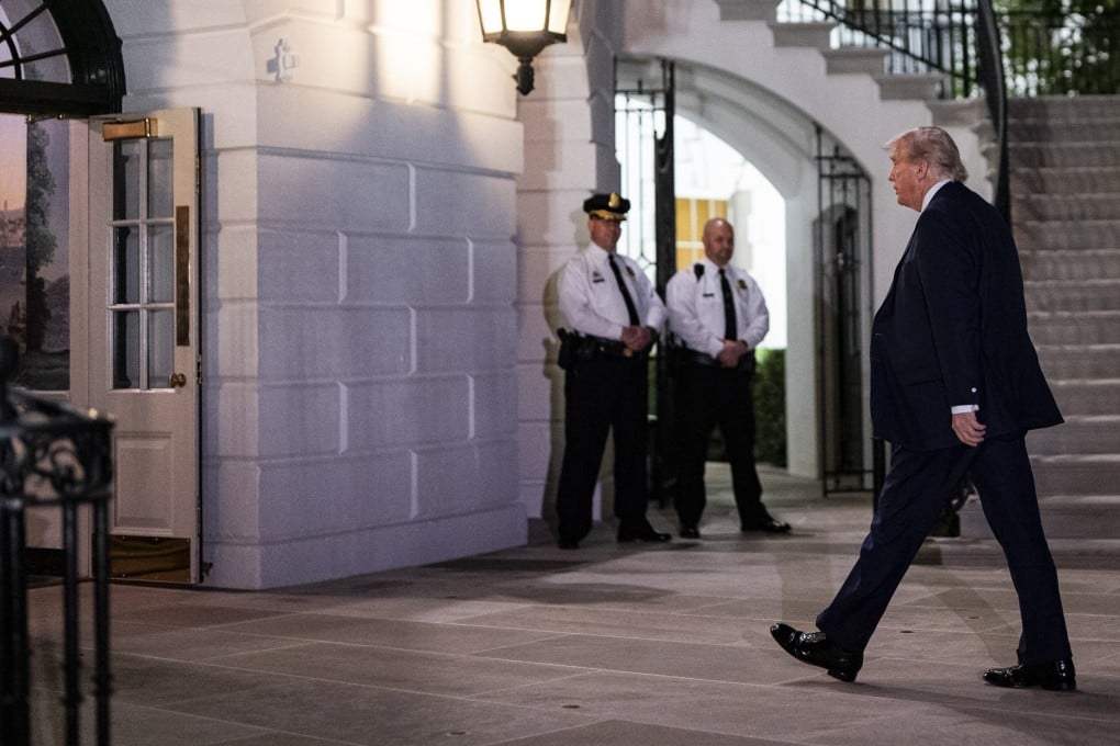 US President Donald Trump walks into the White House after arriving on Marine One on Thursday. Photo: EPA-EFE