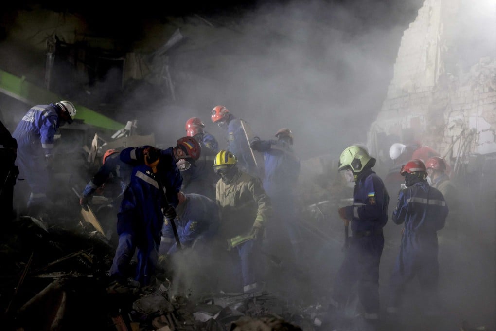 Ukrainian rescuers work at the site of a Russian missile attack in Kyiv on April 24. Photo: AFP