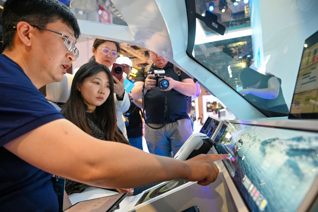 Visitors trying out an in-car entertainment system at the 2025 Shanghai International Automobile Industry Exhibition on Wednesday, April 23, 2025. Photo: Intel Corporation.