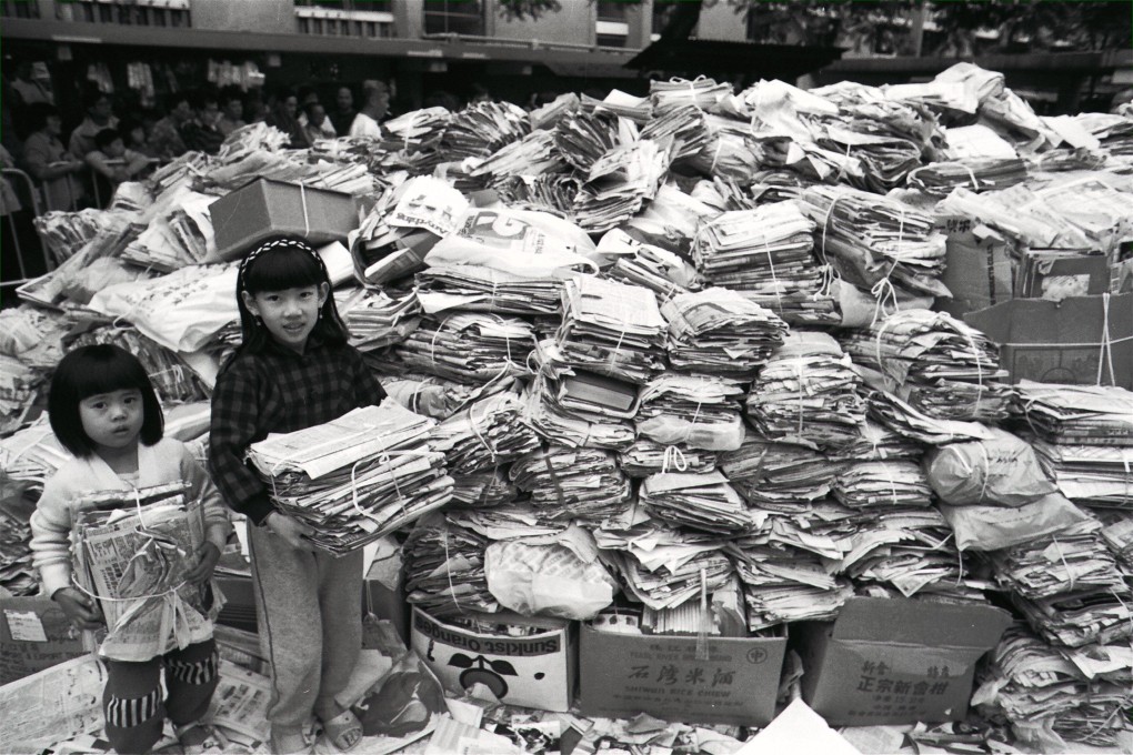Old newspapers are gathered in Kowloon’s Oi Man Estate during a government collection scheme in 1990. Photo: SCMP Archives
