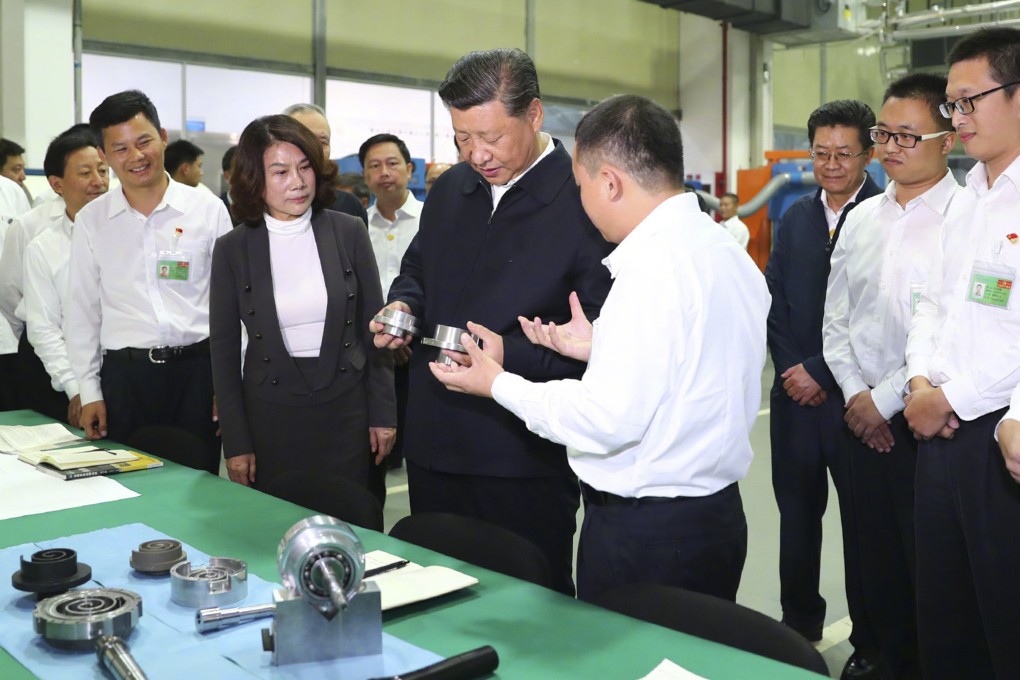 Dong Mingzhu (left), with President Xi Jinping at Gree’s moulding plant back in 2018, has divided opinion with her latest comments about overseas educated jobseekers. Photo: Xinhua