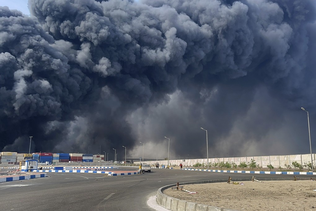 Smoke from a fatal explosion is seen at a port near Bandar Abbas, Iran, on Saturday. Photo: via AP