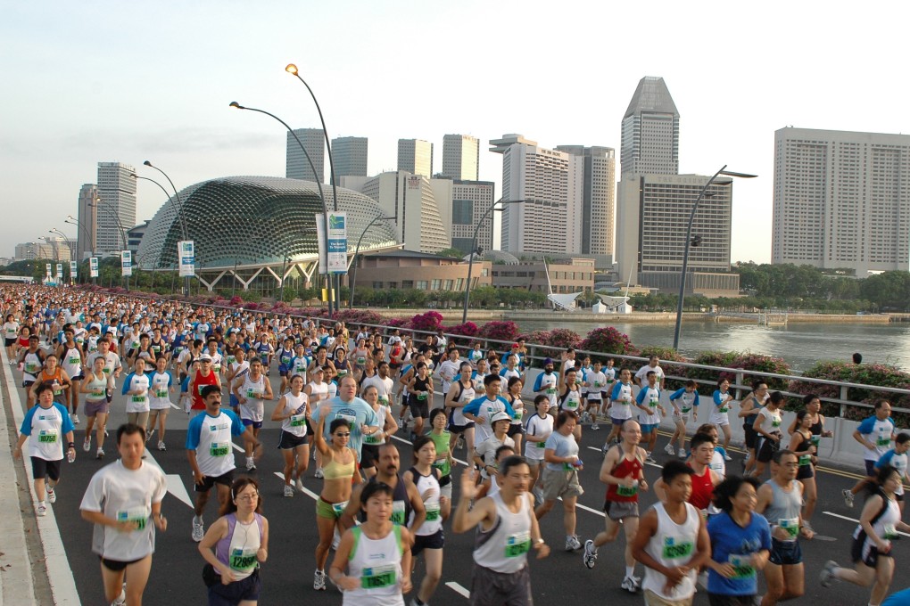 Thousands of competitors take to the streets in the Standard Chartered Singapore Marathon. Photo: Handout