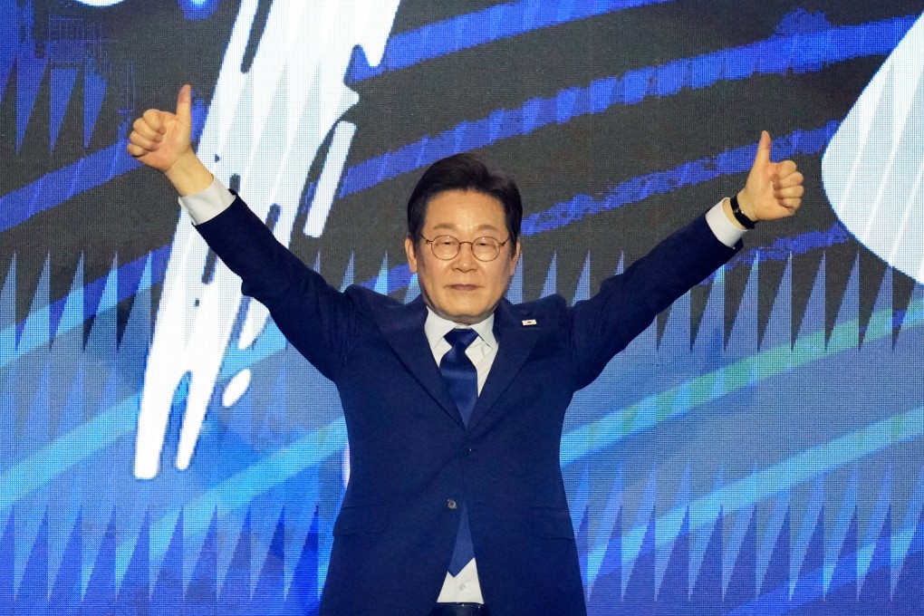 South Korea’s Lee Jae-myung celebrates after winning the Democratic party’s nomination for the June 3 presidential snap election, on Sunday. Photo: AP