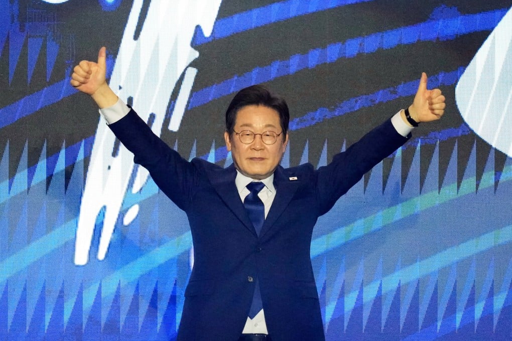 South Korea’s Lee Jae-myung celebrates after winning the Democratic party’s nomination for the June 3 presidential snap election, on Sunday. Photo: AP