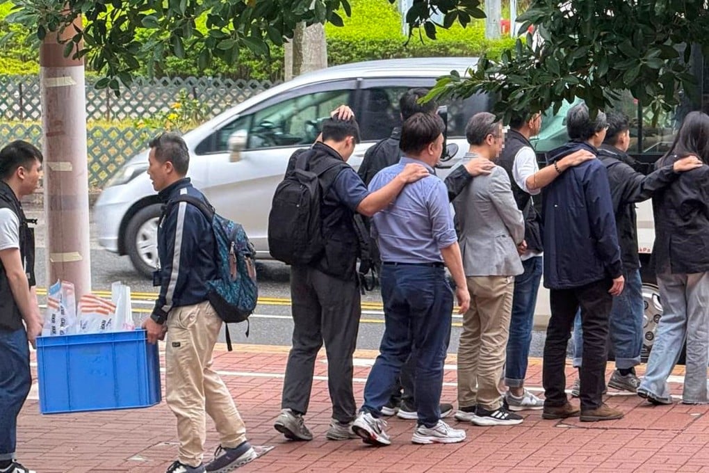 Four men and six women aged between 30 and 70 have been arrested following raids on an office in Central. Photo: SCMP