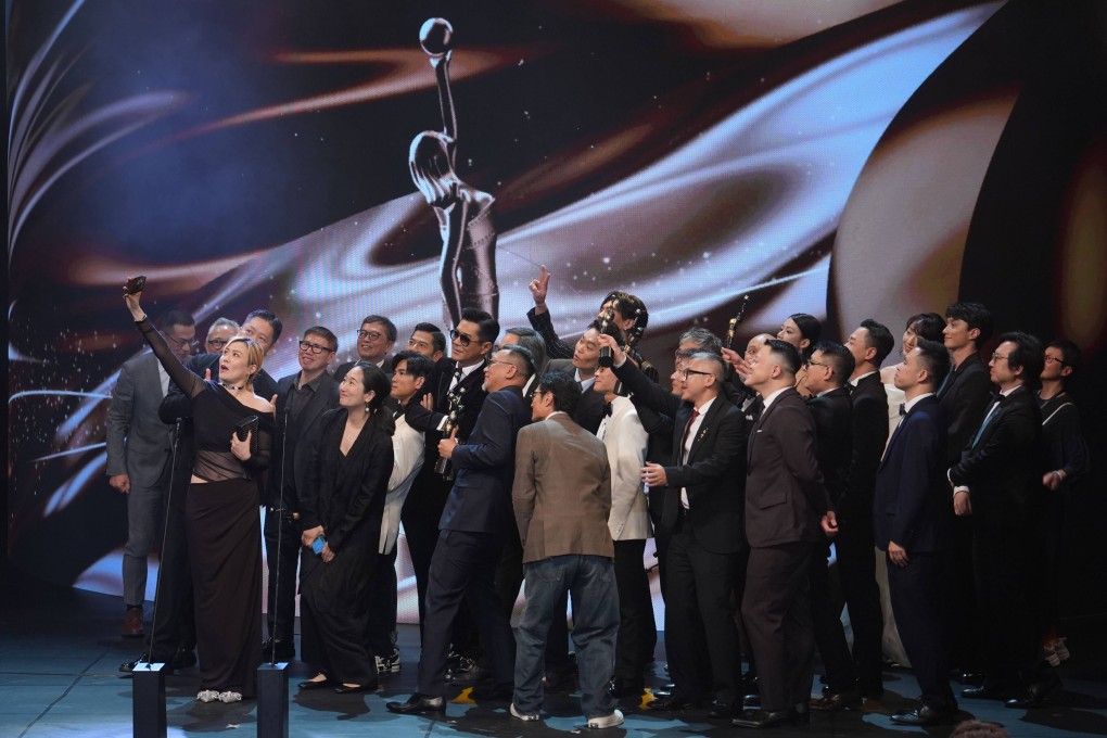 Cast and crew members of Twilight of the Warriors: Walled In celebrate the best film win. Photo: Eugene Lee